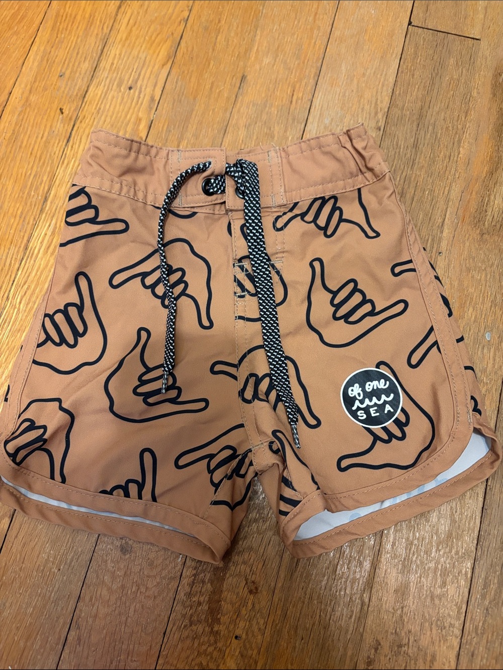 Of One Sea Shaka board shorts